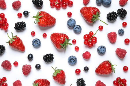 Mix of fresh berries on white background, flat layの写真素材