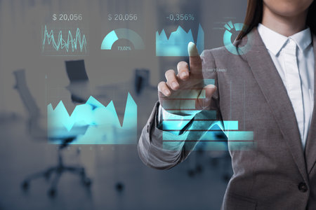 business analytics. Woman and virtual screen with graphs in office, closeup