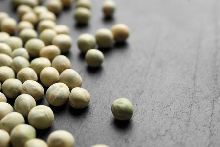 Raw dry peas on gray background, closeup. vegetable seedsの写真素材