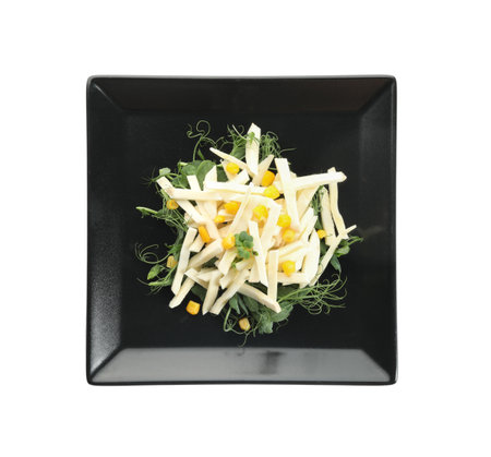 Delicious carrot salad with corn isolated on white, top view