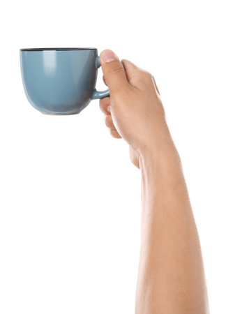 Woman holding blue cup on white background, closeupの写真素材