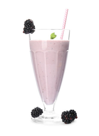 Tasty fresh milk shake and blackberries on white backgroundの写真素材