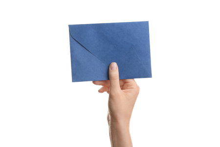 Woman holding blue paper envelope on white background, closeupの写真素材