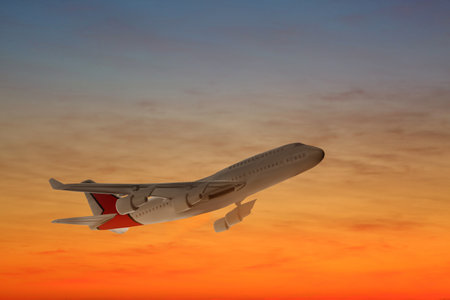 Airplane flying in the sky at sunset. Air transportation