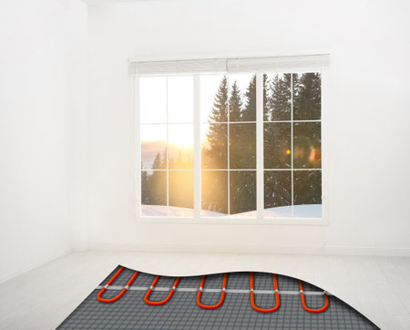 cold season comfort. Room with installed underfloor heating system, illustrationの写真素材