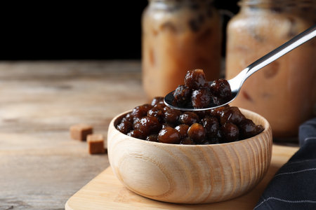 Tapioca balls for milk bubble tea on wooden table, closeupの写真素材