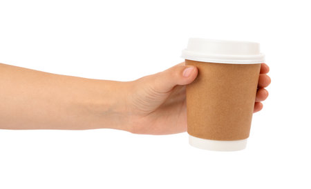 Woman holding takeaway paper coffee cup on white background, closeupの写真素材