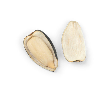 Raw peeled sunflower seed and shell isolated on white, top view