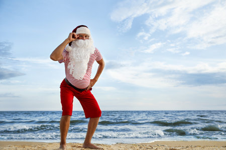 Santa Claus on the beach, space for text. christmas holidaysの写真素材