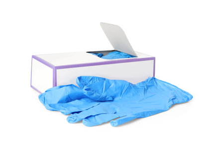 Box of new medical gloves isolated on whiteの写真素材