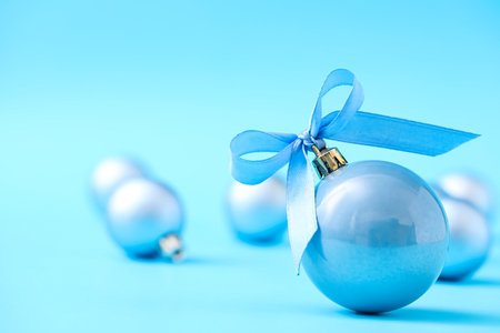 Beautiful Christmas balls on light blue background. Space for textの写真素材