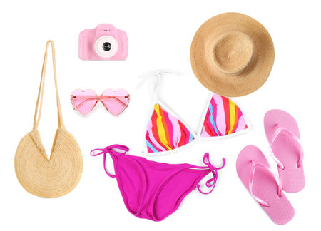 Set with swimsuit and summer accessories on white background, top view. beach lookの写真素材