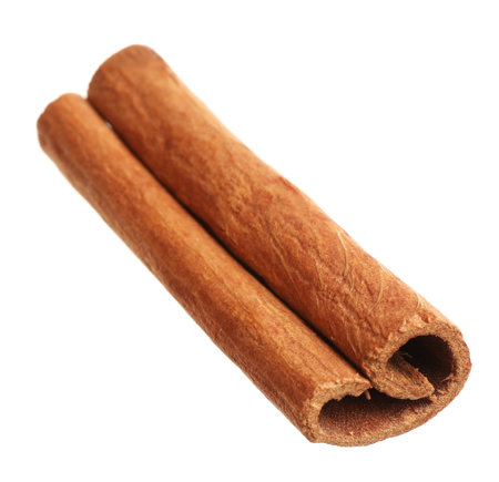 Dry cinnamon stick isolated on white. Mulled wine ingredientの写真素材