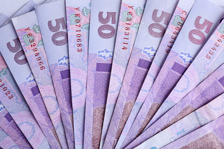 Ukrainian money as background, top view. National currency