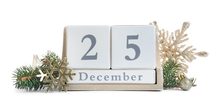 Wooden block calendar and decor on white background. christmas celebration
