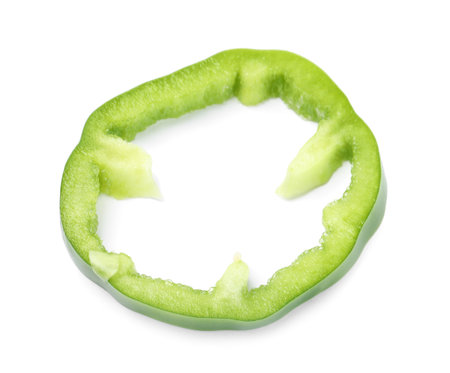 Slice of green bell pepper isolated on whiteの写真素材