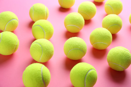 Tennis balls on pink background. sports equipmentの写真素材