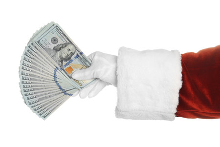 Santa holding dollar bills on white background, closeupの写真素材