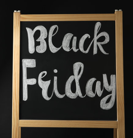 Board with phrase Black Friday on dark backgroundの写真素材
