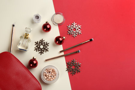 Flat lay composition with decorative cosmetic products on color background. Winter careの写真素材