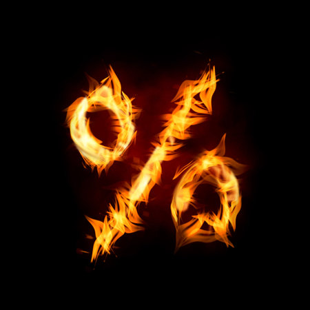 Bright flaming percent symbol on black backgroundの写真素材