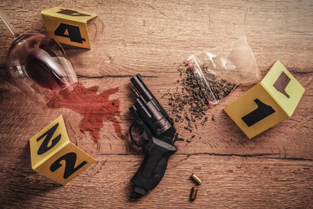 Flat lay composition with evidence and crime scene markers on wooden backgroundの写真素材