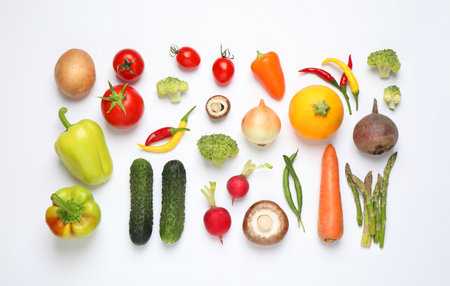 Flat lay composition with fresh vegetables on white backgroundの写真素材