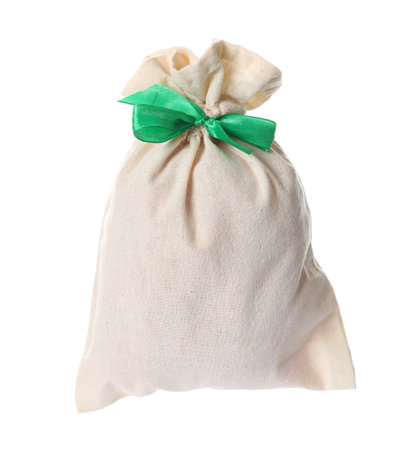 Small bag with green ribbon isolated on white. Christmas advent calendarの写真素材