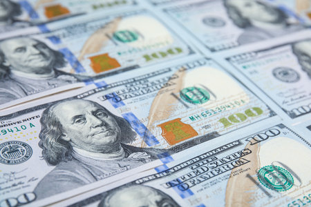 Many dollar banknotes as background, closeup viewの写真素材