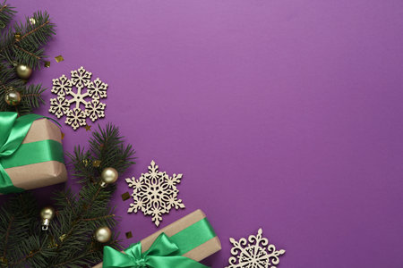 Flat lay composition with gifts on purple background, space for text. Boxing day conceptの写真素材