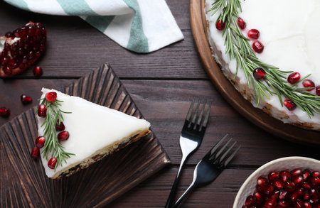 Traditional homemade Christmas cake served on wooden table, flat layの写真素材