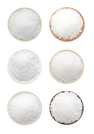 Set of bowls with salt on white background, top viewの写真素材