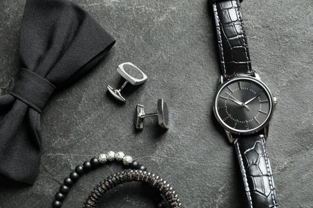 Flat lay composition with luxury wrist watch on black backgroundの写真素材
