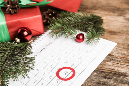 Calendar with marked Boxing Day date near giftsの写真素材