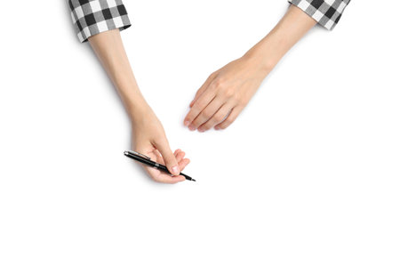Woman with pen on white background, top view. closeup of handsの写真素材
