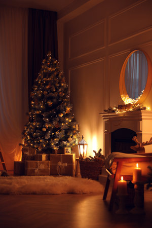 Beautiful room interior with Christmas tree and fireplaceの写真素材