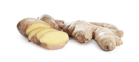Cut fresh ginger root isolated on whiteの写真素材