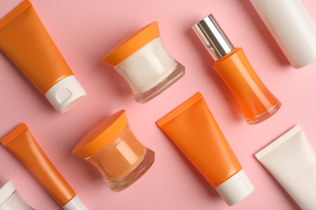 Set of luxury cosmetic products on pink background, flat layの写真素材