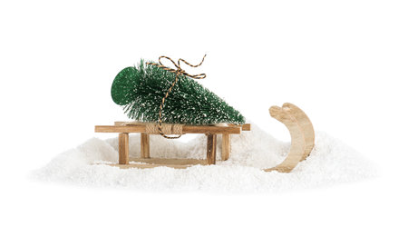 Sleigh with decorative Christmas tree on white backgroundの写真素材