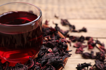 Fresh Hibiscus tea on wooden table, closeupの写真素材