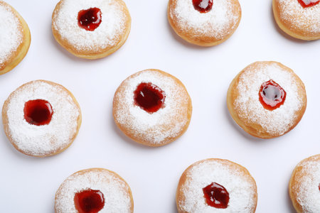 Hanukkah donuts with jelly and sugar powder on white background, top viewの写真素材