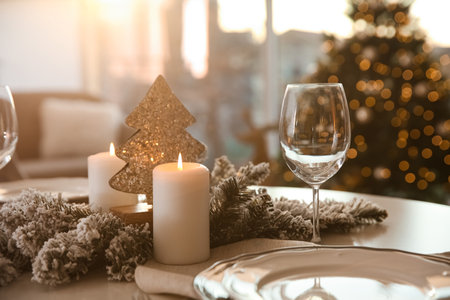 Elegant table setting with Christmas decor indoorsの写真素材