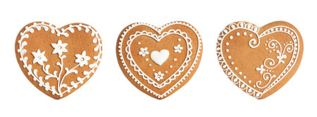 Set of Christmas gingerbread heart shaped cookies on white background. banner designの写真素材