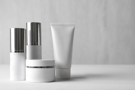 Set of luxury cosmetic products on white table. Space for textの写真素材