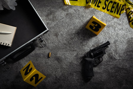 Evidence and crime scene markers on gray stone background, flat layの写真素材