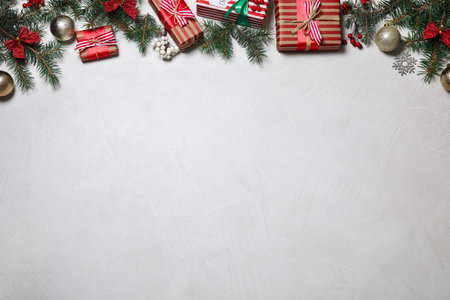Flat lay composition of color Christmas gift boxes on light background. Space for textの写真素材