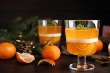 Delicious tangerine jelly on brown wooden tableの写真素材