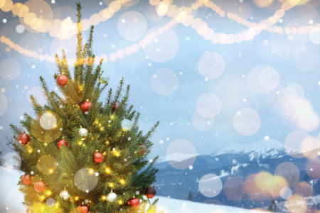 Beautiful decorated Christmas tree outdoors, space for text. bokeh effectの写真素材