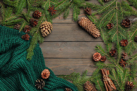 Flat lay composition with pinecones on wooden background. Space for textの写真素材