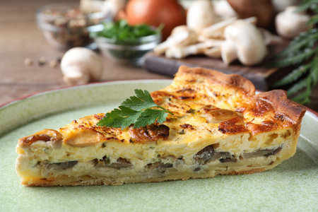 Delicious pie with mushrooms and cheese on plate, closeupの写真素材